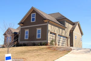 The Benefits of Seamless Gutters vs. Traditional Sectional Gutters